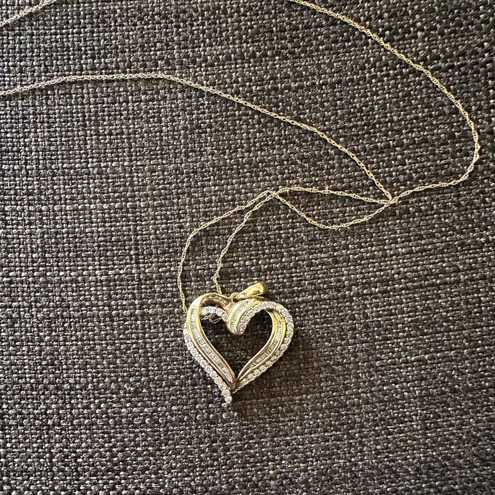 1/2 CT. T.W. Diamond Double Row Ribbon Heart Pendant in 10K Gold